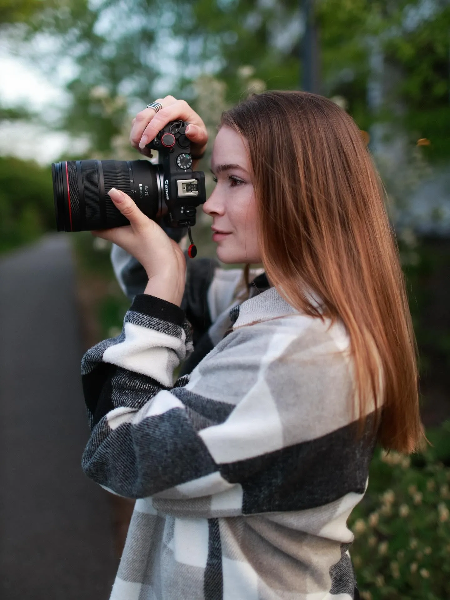 Liubov Kholiavchenko, New Jersey photographer, with her camera